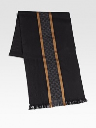 Winter scarf with interlocking GG pattern, stripes and fringe. 13¾W X 71L Silk/wool; dry clean Made in Italy 
