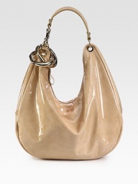 Lustrous patent leather in slouchy carryall topped with polished silvertone rings.Shoulder strap with hook, 7½ dropTop-zip closureOne inside zip pocketOne inside open pocketSuede lining16¾W X 12¼H X 5¾DMade in Italy