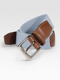 EXCLUSIVELY OURS. We've added a hint of stretch ease to a classic look, lending superior comfort to an all-season style. Kipskin tabs Nickle-plated buckle About 1¼ wide Made in USA 