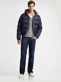 An essential piece of every man's winter wardrobe, designed in a puffer style from channel-quilted nylon with knit detail and a drawcord hood. Zip frontDrawcord hoodSide zip pocketsAbout 27 from shoulder to hemPolyamideMachine washImported