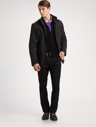 A sleek interpretation of a traditional gentleman's essential, the Tech Moto sport coat is cut for trim Black Label proportions and accented with luxe hardware for authentic biker style.Zip frontThree-button placketAngled chest zip pocketsFront flap pocketsFully linedPolyesterDry cleanImported