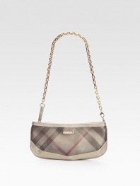 A slim bag crafted from check-print PVC with rich leather trim and a chic chain strap.Removable chain strap, 12 dropTop zip closureNylon lining9¼W X 4½H X 1½DImported