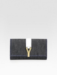 A sleek pairing of denim and leather defines this flap front bag, accented with signature Y hardware.Flap and snap closureOne inside open pocketSatin lining11W X 6½H X 1¼DMade in Italy