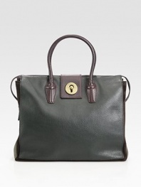 Rich pebble-grain leather crafted in a roomy top-handle silhouette.Double top handles, 5 drop Zip-top closure Protective metal feet One inside zip pouch Suede lining 14¼W X 11H X 6D Made in Italy