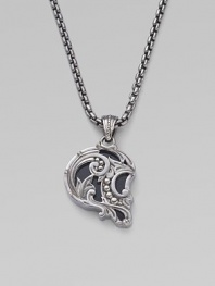 From the No Regrets Collection. It's shaped like a skull in profile, but this pendant is graceful rather than ghoulish, with swirls and curves of sterling silver and inlays of black onyx.Black onyx Sterling silver Necklace length, about 24 Pendant length, about 1 each Lobster clasp Imported