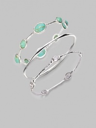 From the Silver Wonderland Collection. Richly veined, faceted ovals of bright turquoise are set all around a graceful sterling silver bangle. Turquoise Sterling silver Diameter, about 2½ Imported