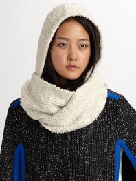 This nubby cotton knit wraps around the head and shoulders as a cozy topper to any outfit.Cotton Dry clean Imported