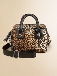 Three rows of zippers, a lock and key and animal print adds a little edge to this structured bag for your girl. Double top handles, about 4 dropAdjustable detachable shoulder strap, about 15 dropTop zip closure, lock and keyThree separate zippered compartmentsApproximately 8W X 6H X 4DCotton lining65% nylon/35% spandexImported