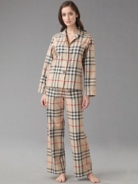 Menswear-styled set is chic and comfy in a big bold check. Piping trim Notch collar top Button front Elastic waist pants French cotton; machine wash Imported