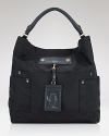 In versatile black nylon, MARC by MARC JACOBS' leather-trimmed hobo epitomizes the label's city-chic look.