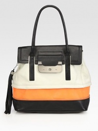 Ultra-chic colorblock leather crafted in a structured flap-top silhouette with zipper details and a tassel at the side.Double top handles, 8 dropTurnlock flap closureProtective metal feetCenter zip compartmentOne inside zip pocketTwo inside open pocketsCotton lining15W X 12H X 7DImported