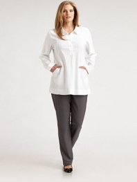 The perfect wear-everywhere piece, finished with side slash pockets and delicate gathered details.Shirt collarButton placket with gathered detailSide slash pocketsLong sleeves with button cuffsGathers at back yokeAbout 32 from shoulder to hem62% linen/36% viscose/2% spandexDry cleanImported of Italian fabric