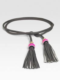 A soft, supple leather style with playful tassels and a tie closure. Width, about ½Imported 