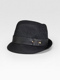 A light, cool and comfortable fedora, sculpted with a vintage flair in paper toyo with a leather band and gold arrow detail. Not intended for rainy weather Brim, about 2 wide Paper/cotton Spot clean Made in USA 