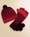 Soft and warm, with a cheery Nordic pattern and two bobbly pompoms. Thumb warmerPretty color paletteDry cleanImported