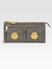 A bold take on color, this quilted leather design features chic goldtone accents.Zip closure One outside zip pocket One outside open pocket Two outside flap pockets with clasp closure Two center compartments Two inside bill slots Twelve credit card slots Cotton lining 8W X 4H X 1D Imported