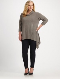 Comfort and style come together in this stylish design. Draped neck Three-quarter length sleeve Pull-on style About 30 from shoulder to hem 95% viscose/5% spandex Hand wash Imported 