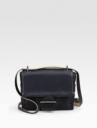 A petite flap-front silhouette pairs burnished glovetan, glazed bridle and vachetta leathers with a chic denim body.Adjustable crossbody strap, 24-26 dropSnap flap closureOne outside open pocketOne inside zip pocketOne inside open pocketFully lined7W X 6H X 2DImported