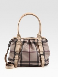 Ultra-smooth leather trim frames this top-handle shape perfectly, featuring the signature Burberry check on PVC. Double leather top handles, 8 dropAdjustable detachable leather shoulder strap, 18¼-20 dropMagnetic snap closureOne inner zip compartmentThree inside zip pocketsCotton lining12W X 10H X 4¾DImported