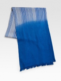 Thick and thin stripes meld into a bold field of color in this elegant scarf, crafted in Italy of luxurious cotton and silk.Fringed ends14W X 76L60% cotton/40% silkImported