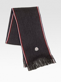 A luxurious addition to any winter wardrobe in soft wool fleece. Fringed ends Applied logo detail About 69 long Fleece wool Dry clean Made in Italy 