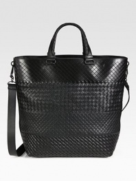 Iconic woven leather tote with adjustable shoulder strap for comfortable cross-body wear.Magnetic snap button closureTop handleAdjustable shoulder strapFully lined12¾W x 14½H x 6½DMade in Italy