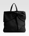 EXCLUSIVELY AT SAKS. A pretty and practical tote crafted from buttery leather, with an asymmetrical bow and handy inside pouch.Double handles, 5 drop Snap top closure Attached inside zip pouch Suede lining 15½W X 14½H X 2½D Imported