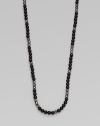 Matt onyx beads and faceted hematite in a smartly draped necklace.Matt onyx beadsHematite beadsBlack rhodium-plated sterling silver lobster clasp closureNecklace, 24 longImported