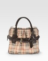 Burberry checks lends an iconic touch to this structured leather silhouette, finished with a front inverted pleat and buckled straps.Double top handles, 6 drop Top zip closure One inside zip pocket Two inside open pockets Cotton lining 14W X 11½H X 7D Imported