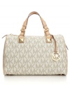 MICHAEL Michael Kors styles the classic purse in super-soft leather and adds bold hardware for a chic, modern finish.