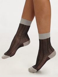 A luxurious, striped design with contrast toe, ankle and leg band. Ribbed leg bandFlat toe seamSilkHand washMade in Italy 