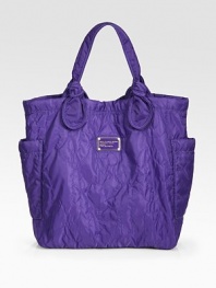 EXCLUSIVELY AT SAKS in Royal Purple. Signature letter stitching defines this roomy carryall, finished with oversized pockets and elegantly knotted handles.Double top handles, 8 dropMagnetic top closureTwo outside open pocketsOne inside zip pocketTwo inside open pocketsFully lined20W X 15H X 5½DImported