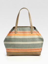 Striped canvas pairs with luxe ostrich-stamped leather in a roomy carryall.Shoulder straps, 8½ dropHook-and-strap closureOne inside zip pocketCotton lining14¾W X 12¾H X 6DImported