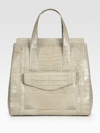 Rich croc-skin lends an exotic touch to this roomy, structured bag.Double top handles, 5 drop Shoulder strap, 22 drop Magnetic top closure Two outside open pockets One outside flap pocket Protective metal feet Two inside zip pocket Four inside open pockets Suede lining 13W X 13½H X 6D Imported