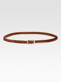 Rich skinny leather strip with goldtone hardware is the perfect waist-cinching accessory.About ½ wide Cow leather Imported 