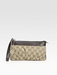 Signature GG jacquard, softly pleated and topped with leather trim and a heart key-chain.Wristlet strapTop zip closureSix credit card slotsFully lined8½W X 5H X 1/2DMade in Italy