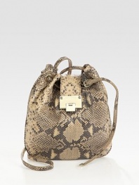 Exotic snake-print leather in a soft, slouchy carryall, cinched at the top by a drawstring closure.Adjustable crossbody strap, 27¾-30 dropFlap-lock over drawstring closureOne inside zip pocketTwo inside open pocketsSuede lining11W X 11¼H X 2¾DMade in Italy