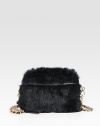 Lush rabbit fur defines this demure bag, finished with a chic chain shoulder strap and leather trim.Shoulder strap, 20 drop Double top zip closures One outside snap pocket Two inner compartments One inside open pocekt Nylon lining 9W X 6H X 2¼D Imported