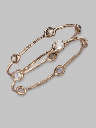 Five faceted ovals of shimmering clear quartz sit within a hammered bangle of 18k gold and sterling silver with a glowing finish of 18k rose goldplating. Clear quartz An alloy of 18K gold and sterling silver plated with 18K rose gold Diameter, about 2¾ Imported Please note: Bracelets sold separately.