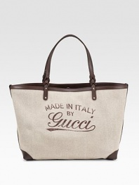 Linen tote with detachable pocket, leather trim, vintage gucci trademark, and light goldtone hardware.Double braided handles, 8 drop Push lock closure Fully lined 20½W X 12½H X 7D Made in Italy