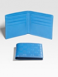 GG coated fabric with leather interior and trim. Two bill compartments Six credit card slots 4¼W X 3¾H Made in Italy