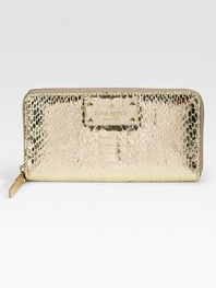 Slim and ultra glam, crafted from metallic snake-embossed leather in a zip-around silhouette.Zip-around closureOne inside zip pocketTwo inside open pocketsTwelve credit card slotsCotton lining7½W X 4½H X 1DImported