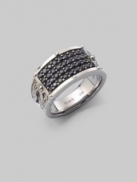 A tapered design in burnished sterling silver is defined by four rows of tiny black sapphires. Sterling silver Black sapphires ¼W X 1 diam. Imported 