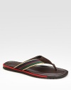 Handsome leather thong sandal with regimental web detail and suede trim. Rubber sole Made in Italy 