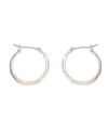 Chic hoops are essentials for your collection. Kenneth Cole New York earrings feature small-sized click hoops in silver tone mixed metal. Approximate diameter: 3/4 inch.