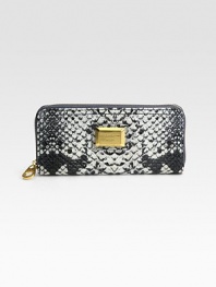 Luxe snake-print highlights this slim zip-around silhouette of rich PVC.Zip-around closureCenter zip compartmentTwo inside open pocketsEight credit card slotsFully lined7¾W X 3/4H X 3¾DImported