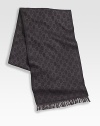 Fine wool scarf with signature GG grid. Fringed ends 14W X 70H Wool Dry clean Made in Italy 