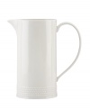 Serve drinks with the Wickford pitcher and tie in timeless sophistication with every meal. Versatile white porcelain in a contemporary shape is embossed with a classic rope motif.