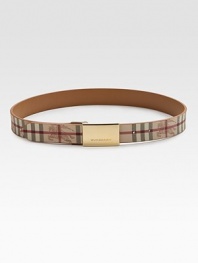 This checked style with a signature engraved buckle, reverses to a solid color for a chic and versatile design. PVCBrassWidth, about 1Made in Italy