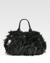 Faux fur east-to-west silhouette, finished with a detachable heritage tag.Double leather top handles, 6 drop Snap top closure Two inside zip pockets Two inside open pockets Signature jacquard lining 18W X 9½H X 9½D Made in Italy